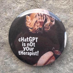 May include: A circular badge with the white text "ChatGPT is not your therapist!". The design includes a dark background and a blurred image of a person with their hands on their head.