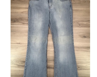 Jeans acampanados de mezclilla azul, lavado claro, talla 13, de la marca Vintage Arizona Jean Co.