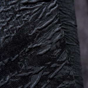 1.35 meters wide black blended irregular reef relief texture fabric windbreaker jacket skirt dress design clothing material G15V12T250126B