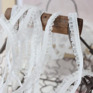 10 Meter 1 cm breites ivory dehnbares elastisches Tüllrüschen Spitzenband Kleidungszubehör Stulpen Rock Kleid Dekorationsmaterial C35U53P241228G