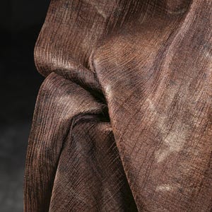 1.5 meters wide deep brown slightly wrinkled gold embossed cotton fabric crack texture shirt skirt pants clothing material T50T15V250715V