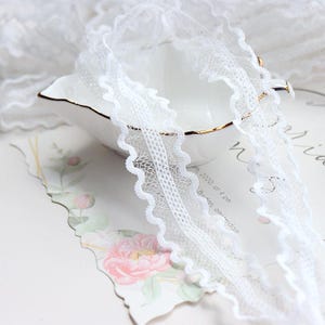 10-15 Meter 2,5 cm 0,98 "breites Elfenbein Mesh Spitzenband elastischer Stretch Band DIY Baby Socken Kleidung Accessoires Material C35U39P241225G