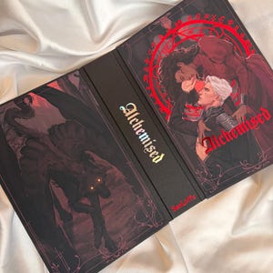 May include: A black book cover titled Alchemised with a central spine featuring the same title in gold. The front cover displays an illustration of two figures within a red circular sigil, while the back cover shows a dark winged creature with glowing eyes.