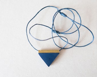 Metallic blue minimalist geometric triangle necklace natural cotton contemporary modern architectural unisex jewellery
