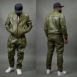 May include: Olive green leather bomber jacket and matching pants set. The jacket has a zip-up front and brown trim. The pants have a relaxed fit. The person is wearing a navy blue baseball cap and white sneakers. The outfit is displayed from the front and back.