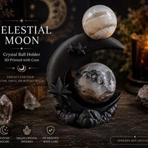 May include: A black 3D printed crescent moon crystal ball holder featuring star accents and a textured base. The stand is designed to hold two spherical objects, one resting on the top curve and one nestled within the center of the moon shape.