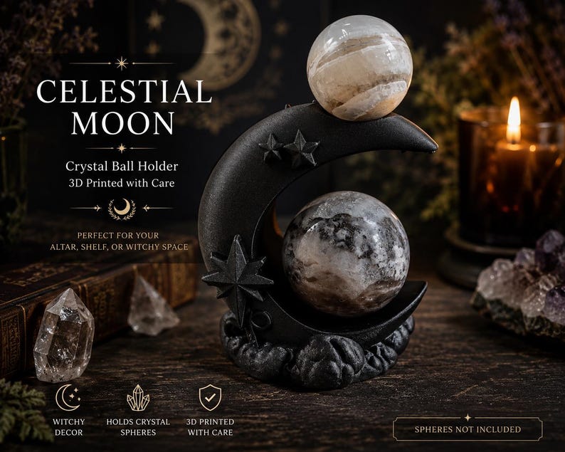 May include: A black 3D printed crescent moon crystal ball holder featuring star accents and a textured base. The stand is designed to hold two spherical objects, one resting on the top curve and one nestled within the center of the moon shape.