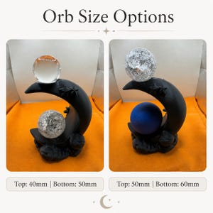 May include: Two black crescent moon stands with star accents, each holding two spherical orbs. The left stand features a clear orb and a crackled glass orb with 40mm and 50mm labels. The right stand features a crackled glass orb and a solid blue orb with 50mm and 60mm labels. Text reads Orb Size Options.