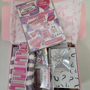 Blind Date with a Kindle Mystery Box | E-Reader Blind Date with A Book Box | Includes Insert, Magnetic Grip, Charm, Dust Plug and More! image 9