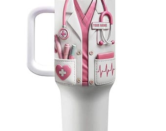 May include: White insulated travel mug with a large handle, decorated with a pink and white design of a doctor's coat, stethoscope, and medical symbols. The text "YOUR NAME" is printed on the design. The mug has a clear lid and a straw.