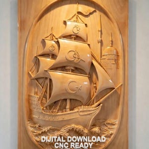 May include: A wooden relief carving of a sailing ship with Turkish flags on the sails, set within an oval frame. The carving includes a mosque and the text "DIGITAL DOWNLOAD CNC READY STL FILE". The artwork is made of light-colored wood.