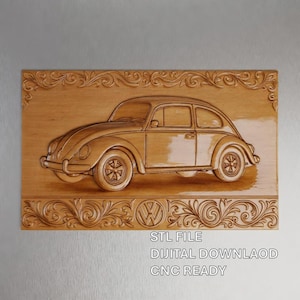 May include: A wooden relief carving of a classic Volkswagen Beetle car. The car is depicted in profile, with detailed wheels and body lines. The carving is framed by ornate scrollwork and includes the Volkswagen logo. The text "STL FILE", "DIGITAL DOWNLOAD", and "CNC READY" is visible.