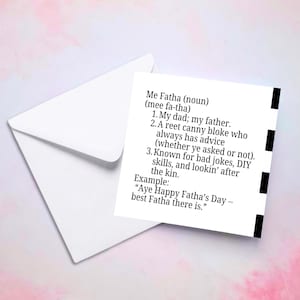 May include: A white greeting card with black accents and text that reads "Me Fatha (noun)" with definitions and an example. The card is inside a white envelope, set against a pink and white background.