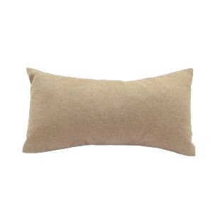 May include: A light brown rectangular pillow with a soft, textured fabric.