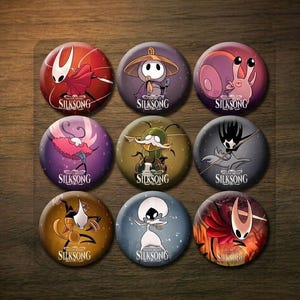May include: Nine circular pin badges featuring character designs from the video game Silksong. The badges display illustrations in shades of red, purple, yellow, and blue, with the game's title printed on each.