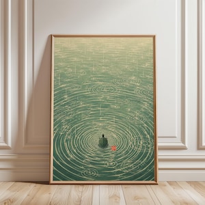 May include: A framed vertical art print featuring a green water surface with concentric ripples caused by rain. A small turtle is positioned in the center of the ripples. A small red square seal is visible near the turtle on the water surface.