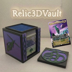 May include: A black and purple 3D-printed card storage box with a removable lid featuring a green circular emblem. The box displays a side window showing a card and a side panel with a green emblem. A Hearthhull, the Worldseed card is visible.