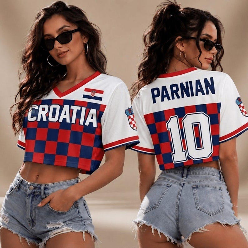 May include: A white cropped jersey featuring a red and blue checkered pattern on the lower half. The front displays the text CROATIA and a small flag. The back features the name PARNIAN and the number 10 in white with blue and red outlines.