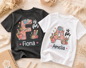 Maglietta personalizzata per bambini con lettere floreali, maglietta con nome personalizzato per bambine, maglietta per il ritorno a scuola, maglietta per neonati, regalo di compleanno per bambini