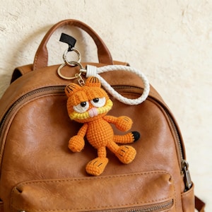 garfield mini backpack Loungefly & Pooky Plush Cosplay Steve's Hallmark Add a touch of classic comic charm to your look with this orange Garfield novelty mini backpack Garfield & Pooky Plush Cosplay