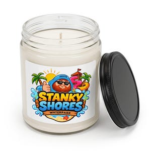 Stanky Shores Waterpark candle with the black lid off, showing the white wax and cotton wick