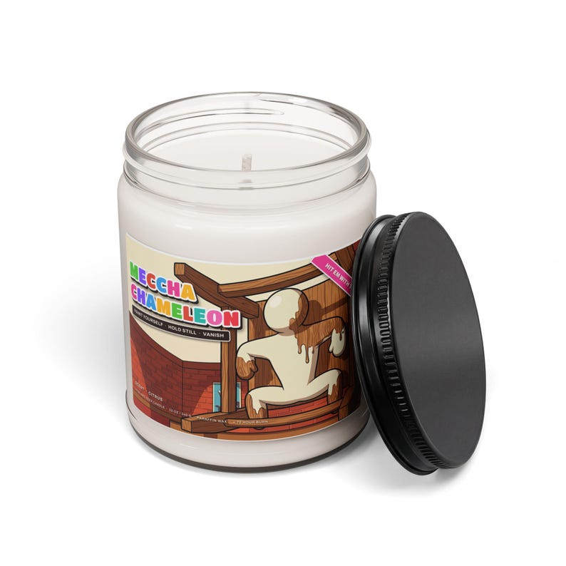 Meccha Chameleon candle with the black lid off, showing white paraffin wax and a single cotton wick