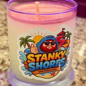 Stanky shores hand poured candle with rose gold magic dust.