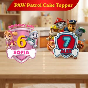 Pu&ograve; includere: Due decorazioni per torte Paw Patrol con personaggi dei cartoni animati. La decorazione a sinistra &egrave; rosa con il numero 6, il nome Sofia e il testo Birthday Girl. Quella a destra &egrave; blu e rossa con il numero 7 e il nome Alex. Entrambe hanno scudi.