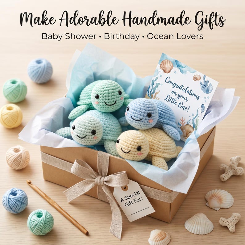 May include: A brown cardboard gift box containing three crocheted sea turtle plushies in light green, blue, and cream. The box includes a card reading Congratulations on your Little One!, a gift tag labeled A Special Gift For:, yarn balls, and a crochet hook.