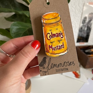 Coleman's mustard brooch image 1