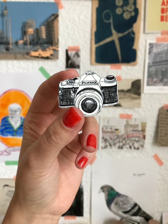 Camera brooch 2024