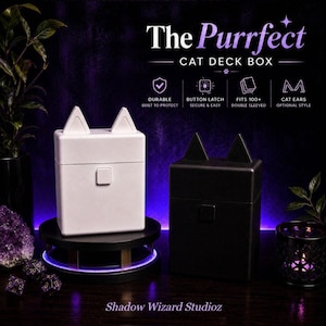 May include: A white and a black rectangular deck box, each featuring two cat ears on top and a square button latch. Text on the image reads: The Purrfect CAT DECK BOX, Durable Built to Protect, Button Latch Secure & Easy, Fits 100+ Double Sleeved, Cat Ears Optional Style, Shadow Wizard Studioz.