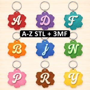 Puede incluir: Una colección de llaveros con forma de flor en varios colores, cada uno con una letra diferente del alfabeto. Los llaveros tienen un anillo metálico para sujetarlos. El texto "A-Z STL + 3MF" se muestra en un rectángulo negro.