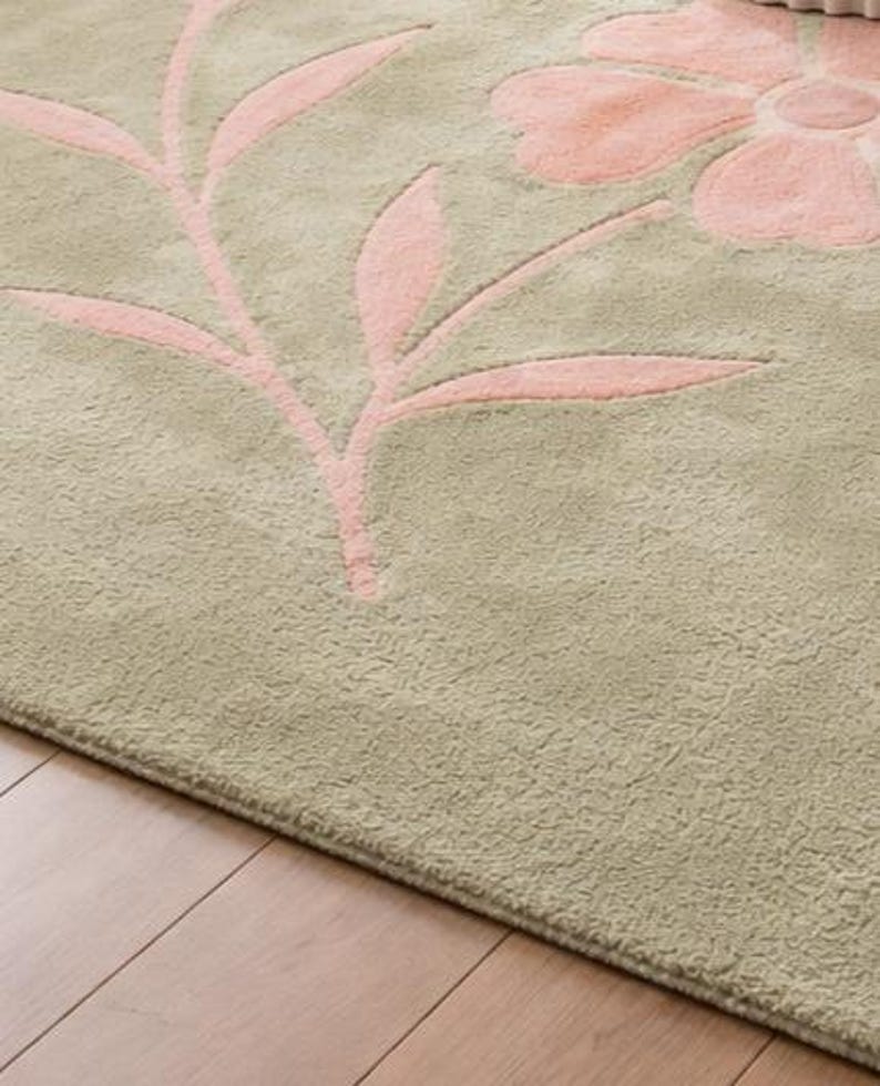 Hand finished sage green rug with embossed pink floral vine design, elegant botanical area rug for living room decor
Sage green area rug with raised pink floral vines, hand finished decorative rug for bedroom or living room
Elegant sage green rug with embossed pink floral pattern, botanical carpet for modern home decor
Textured sage green area rug with pink floral vines, hand finished decorative rug for cozy interiors
Botanical sage green rug with raised pink floral vine detailing, stylish area