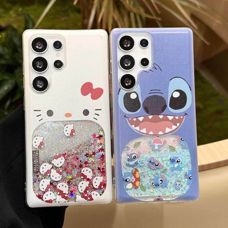 May include: Two phone cases: one white with a Hello Kitty design and a liquid glitter section, the other blue with a Stitch character design and a liquid glitter section. Both cases have multiple camera cutouts.