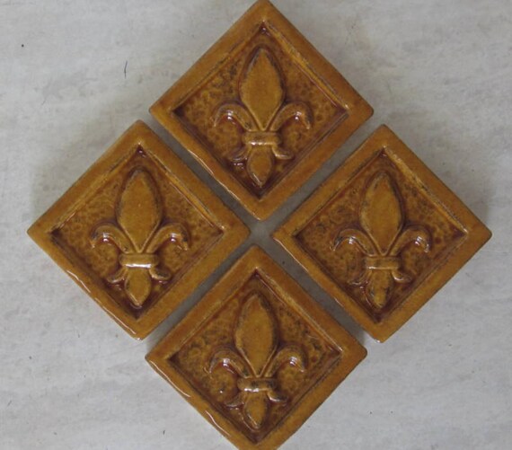 Ceramic Accent Tile Set Of 4 Fleur De Lis 2x2 In Wild Image 0