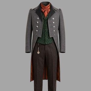 May include: A formal grey coat with a black collar and silver buttons, worn with a green waistcoat, brown trousers, and an orange cravat. A pocket watch hangs from the waistcoat. The outfit is suitable for formal events.