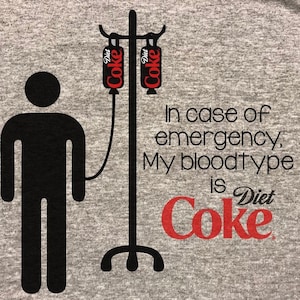 In caso di emergenza, il mio gruppo sanguigno è la maglietta Coca-Cola Light