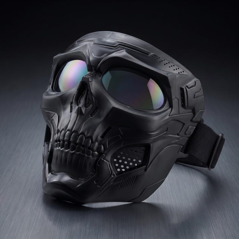 May include: A black skull mask with iridescent lenses. The mask features a detailed skull design with visible teeth and eye sockets. It has an adjustable strap and ventilation holes, suitable for costume or tactical use.