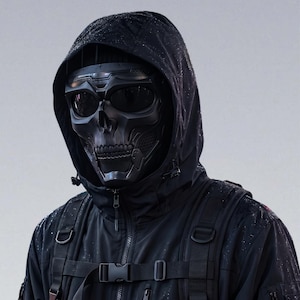May include: A black skull mask with integrated goggles is worn over a black hooded jacket. The mask has a detailed skull design with eye sockets and a jaw. The jacket has a zipper, pockets, and a backpack. The overall aesthetic is dark and tactical.