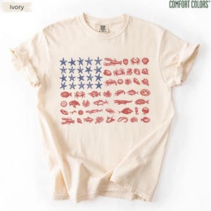 Comfort Colors Seashell USA Flag Shirt, 250th Anniversary 4th of July Tee, Coastal Patriotic Shirt, Beachy Nautical American Flag, USA Gift