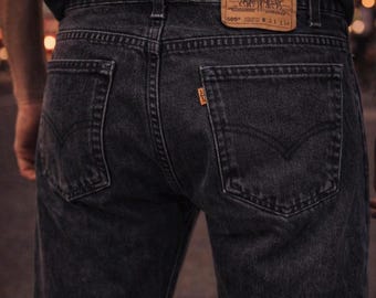 Vintage USA Levi’s 505 Orange Tab Black Faded Jeans