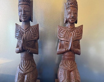 Vintage hand-carved wooden Thai Theppanom guardian angel statues