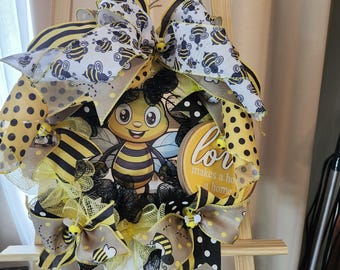 Corona de abejas. Negra y amarilla.