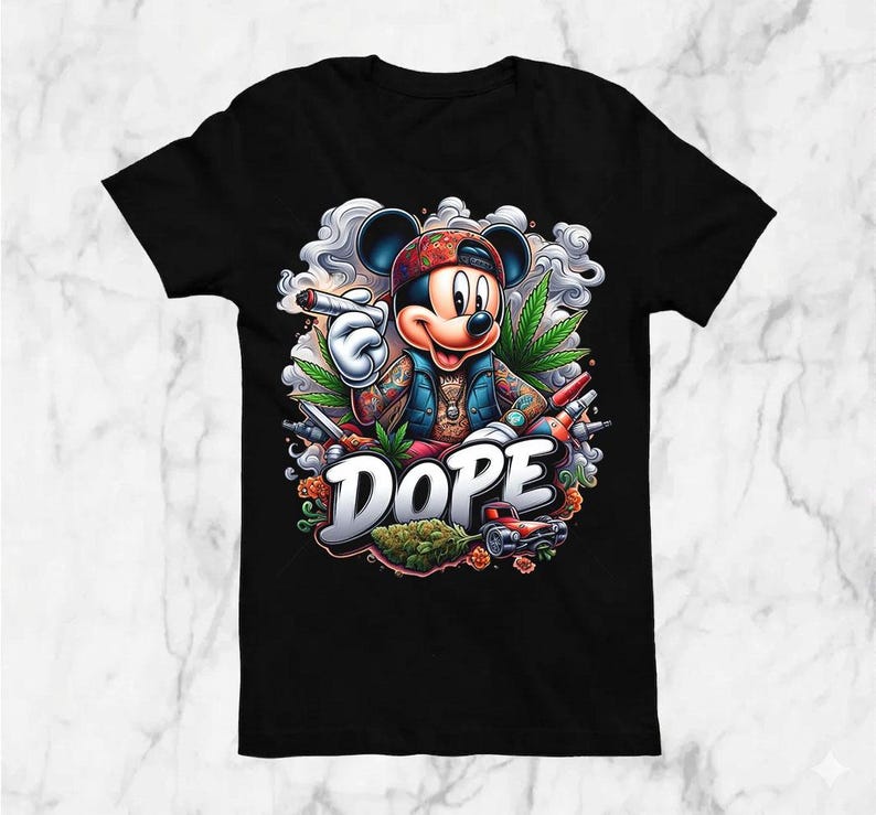 May include: Black t-shirt featuring a cartoon Mickey Mouse character with a red and green patterned hat, holding a lit cigarette. The word "DOPE" is displayed in white, with cannabis leaves and a small red car.