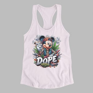 May include: White racerback tank top featuring a cartoon illustration of a mouse character wearing a hat and jacket, smoking a cigar. The word "DOPE" is written in white script below the character, with marijuana leaves and other related imagery.