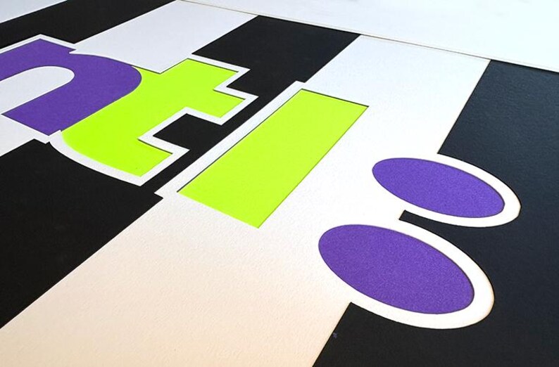 May include: Abstract graphic design with the letters "NTI" in purple and neon green, set against a black and white striped background. Two purple ovals are in the lower right corner. The design has a modern, geometric aesthetic.