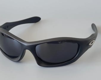 Lunettes de soleil Oakley Monster Dog vintage des années 00 Verres noirs Montures mates polarisées