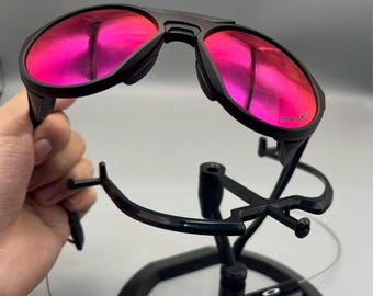 Oakley Clifden OO9440 – Monture noir mat avec verres ronds rubis, Nouveau