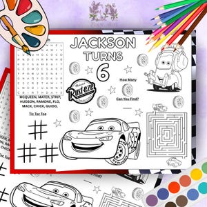 May include: A black and white coloring page featuring Lightning McQueen from the movie Cars. The page includes the text "Jackson Turns 6", a word search, a maze, and other activities. Colored pencils and a watercolor palette are in the background.